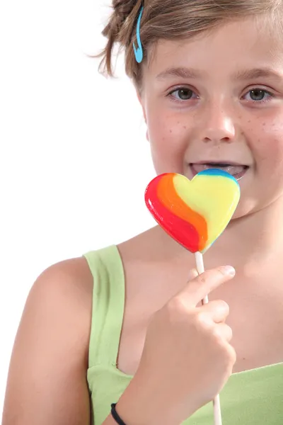 Little girl with a lolly — Stock Photo, Image