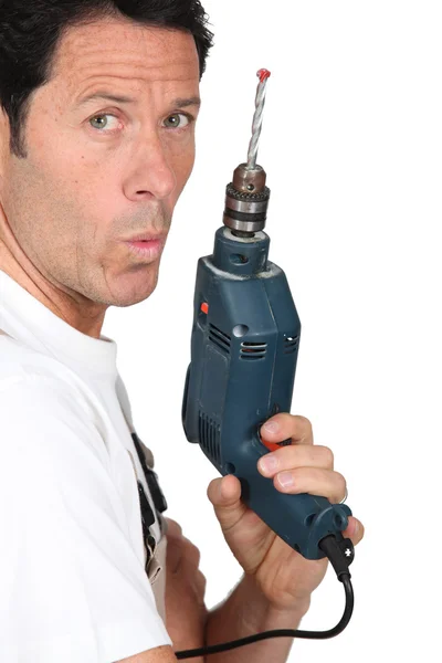 Craftsman holding a drill — Stock Photo, Image
