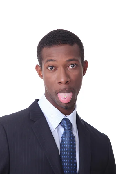 Schwarzer Mann mit durchbohrter Zunge — Stockfoto