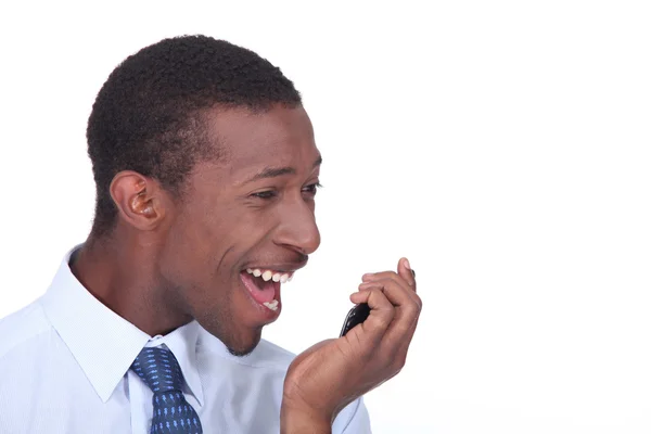 Close-up van een man schreeuwen in zijn mobiel — Stockfoto
