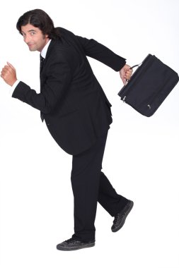 Businessman rushing to go to work clipart