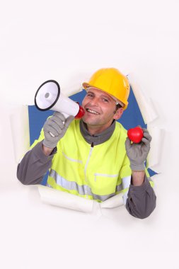 Construction worker proclaiming his love clipart