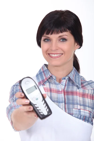 Brunette with blue eyes and cordless phone — Stock Photo, Image