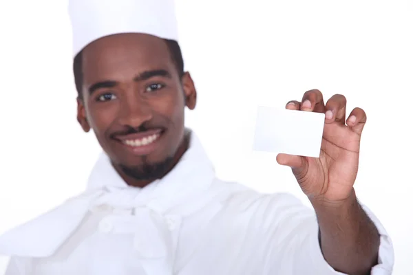 Stock image Chef holding business card