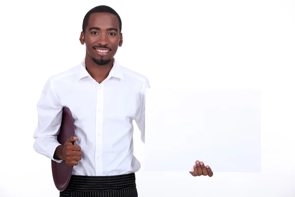 Waiter with a blank board — Stock Photo, Image