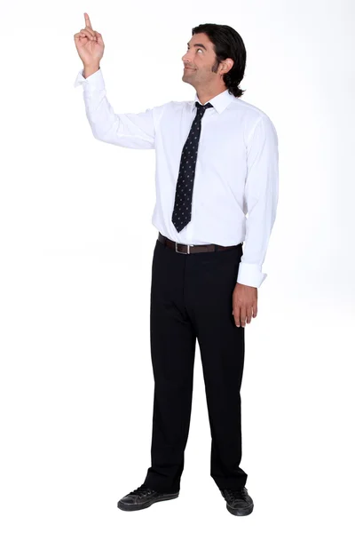 Man looking and pointing upwards — Stock Photo, Image
