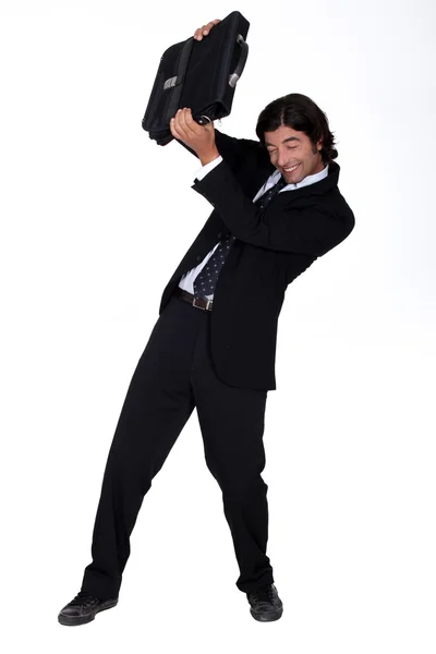 Man in suit dodging attack — Stock Photo, Image