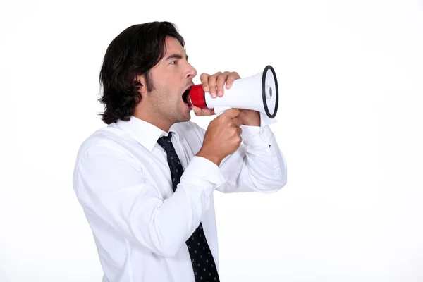 Mężczyzna krzyczy w głośniku — Zdjęcie stockowe