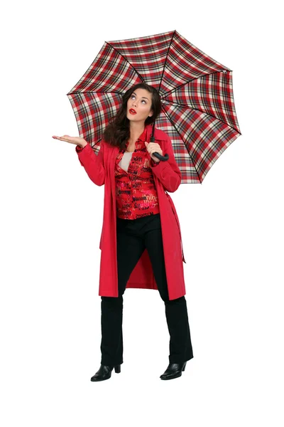 Donna in rosso con ombrello tartan — Foto Stock