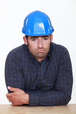 Tradesman staring into space clipart