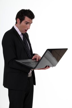 An astonished businessman. clipart