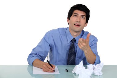 Man experiencing writer's block clipart