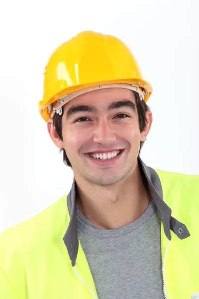 Веселый молодой строитель — стоковое фото