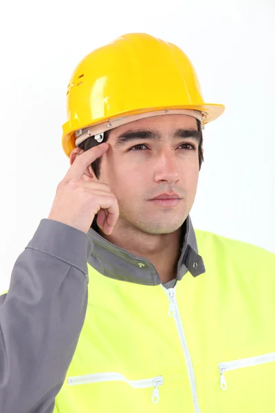 A pensive construction worker. — Stock Photo, Image