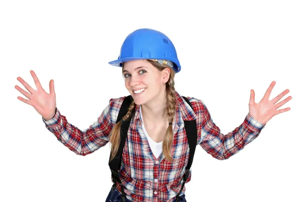Tradeswoman holding up her hands — Stock Photo, Image