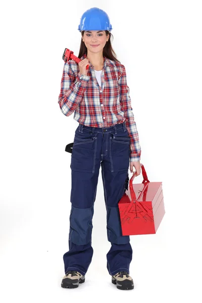 A handywoman with a tool-box. — Stock Photo, Image