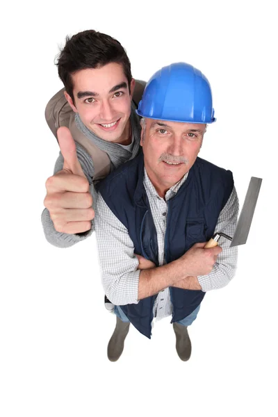 Happy apprentice and mason — Stock Photo, Image