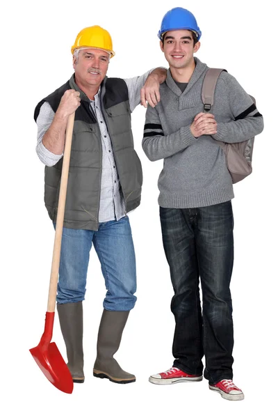 Experienced tradesman welcoming his new apprentice — Stock Photo, Image