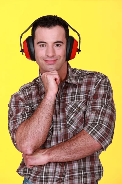 Man wearing ear defenders — Stock Photo, Image