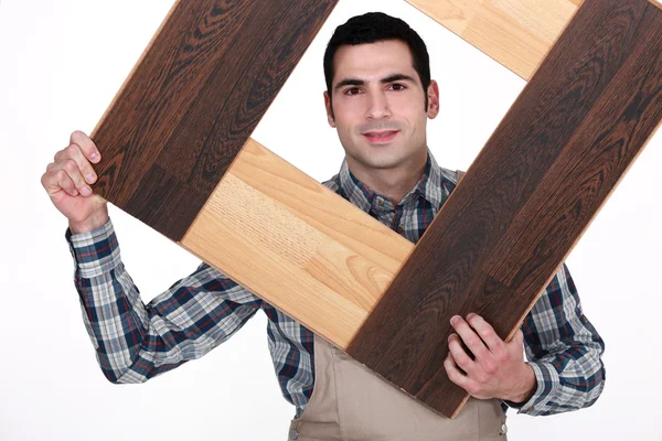 Carpenter building a frame — Stock Photo, Image