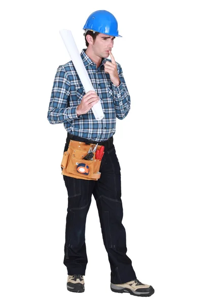 Full-length portrait of carpenter looking puzzled — Stock Photo, Image