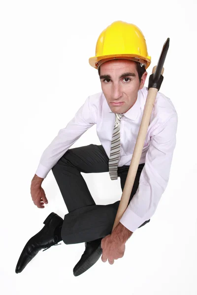 Businessman sat with axe — Stock Photo, Image