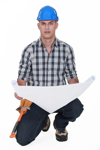 Portrait of foreman holding blueprints — Stock Photo, Image