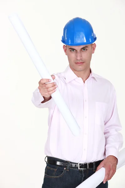 Businessman holding a blueprint — Stock Photo, Image