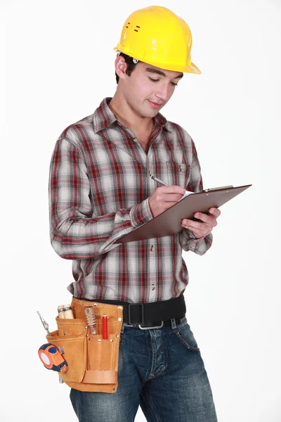 Site inspector holding clip-board — Stock Photo, Image