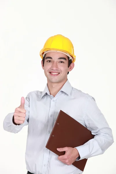 Cheerful architect with clip-board giving the thumbs-up — Stock Photo, Image