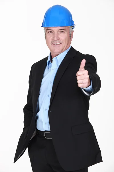 Middle-aged architect giving thumbs-up — Stock Photo, Image