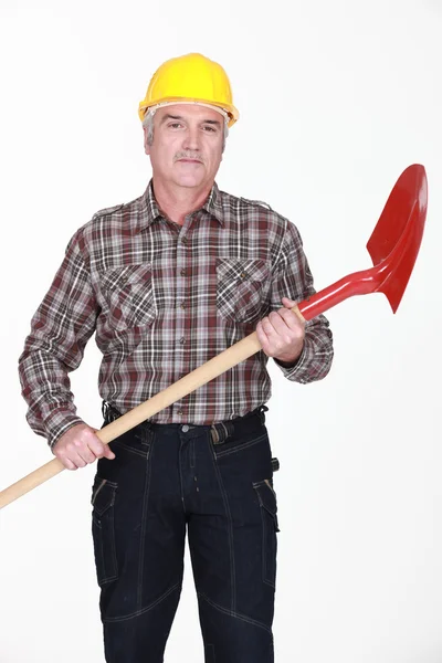 Mature bricklayer with shovel — Stock Photo, Image