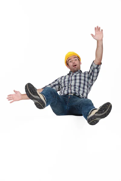 Tradesman che cade in aria — Foto Stock