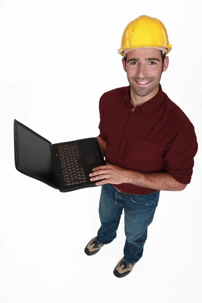Engenheiro com um laptop — Fotografia de Stock