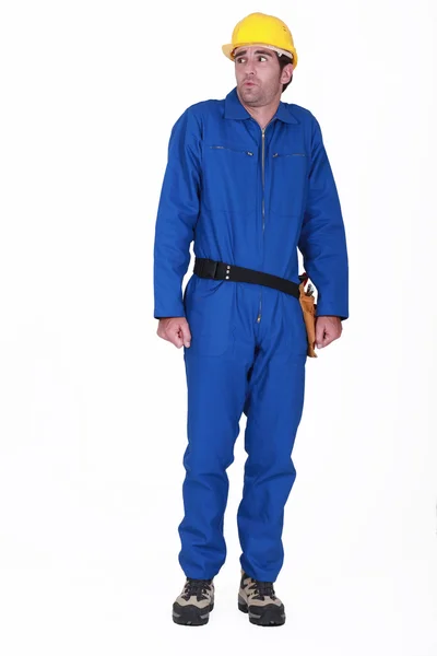 Tradesman in tuta blu essere rimproverato — Foto Stock