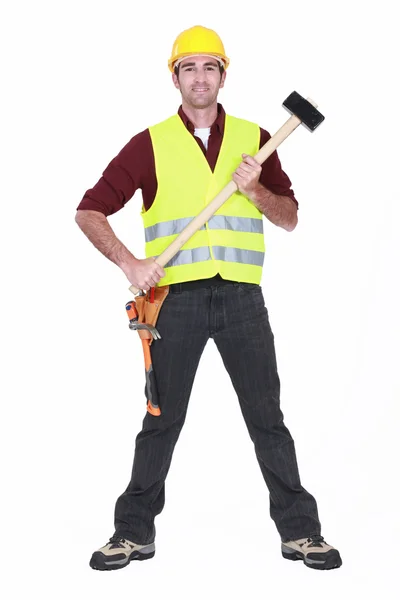 Full-body portrait of carpenter holding hammer — Stock Photo, Image