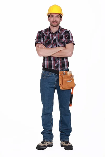 Builder stood with arms crossed — Stock Photo, Image