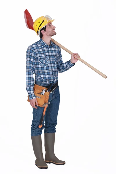 Trabajador de la construcción con una pala — Foto de Stock