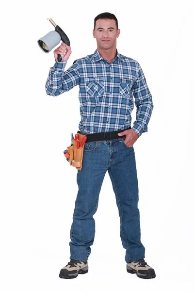 Handyman segurando tocha de sopro — Fotografia de Stock