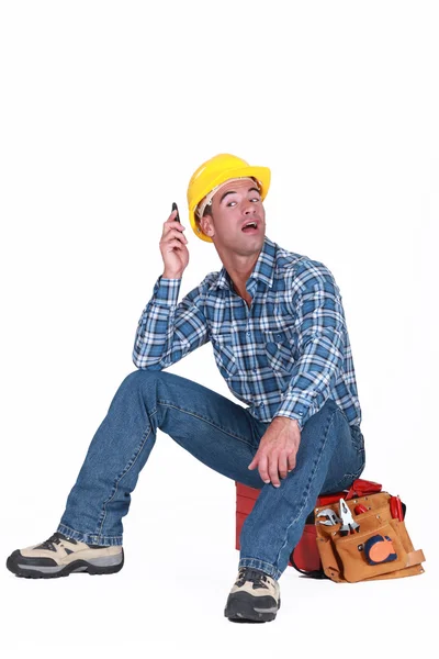 A handyman over the phone. — Stock Photo, Image