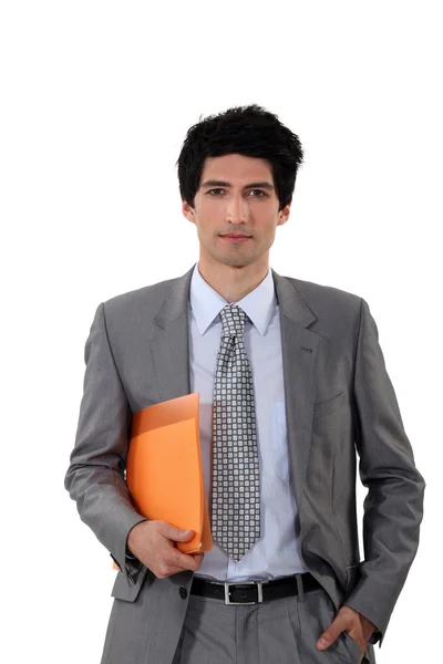 Empresário carregando um arquivo — Fotografia de Stock