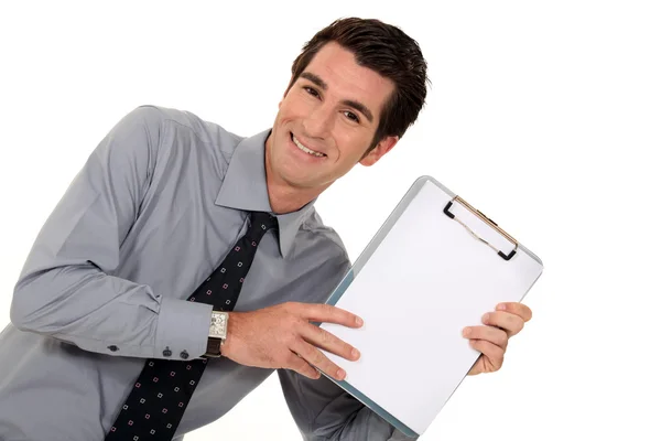 Happy businessman stood with clip-board — Stock Photo, Image