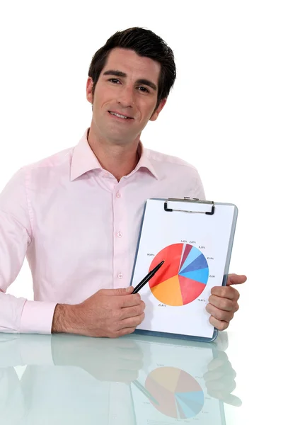 Salesman showing graph of earnings — Stock Photo, Image