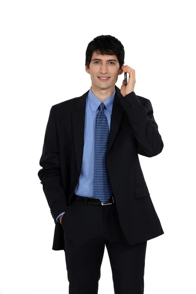 Mladý obchodník na telefonu — Stock fotografie