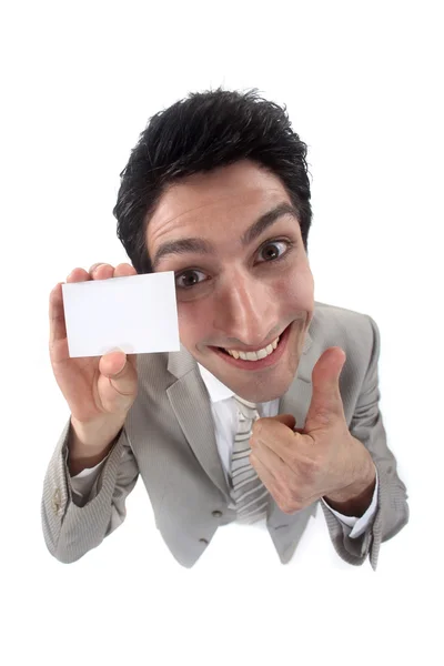 Businessman holding up his business card — Stock Photo, Image