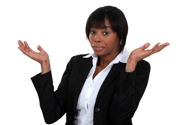 Black woman gesturing that she doesn't know. — Stock Photo, Image