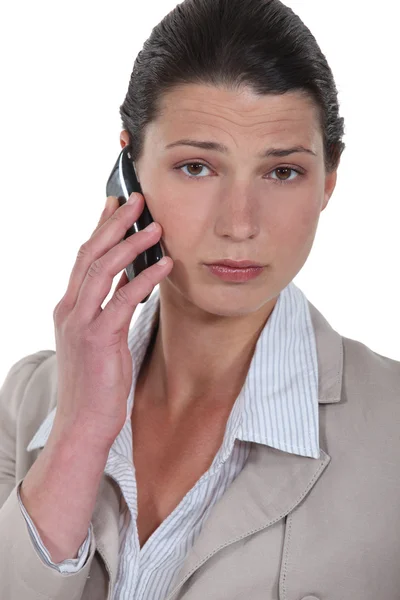 Businesswoman talking on her cell — Stock Photo, Image