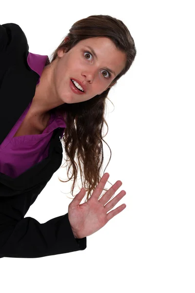 Geschokt zakenvrouw zwaaien hand — Stockfoto