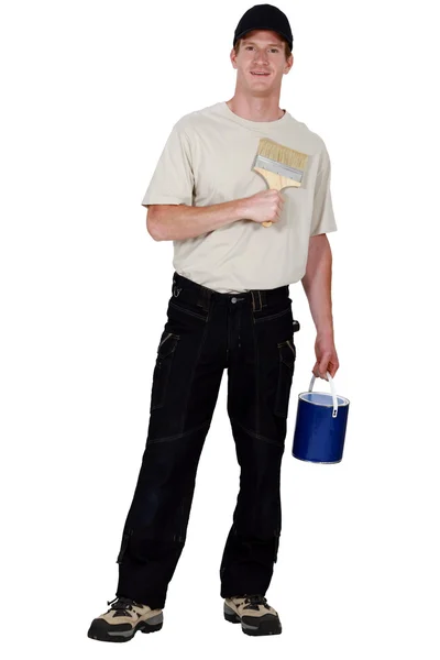 Ambachtsman schilder holding een borstel en een blikje — Stockfoto