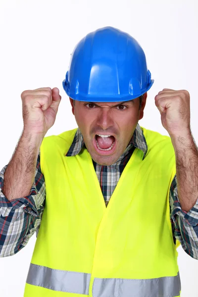 Zuřivý stavební dělník. — Stock fotografie